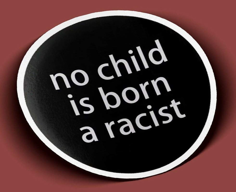 no child is born a racist round sticker
